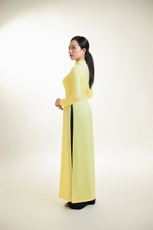 Áo dài gấm lụa vàng nhạt